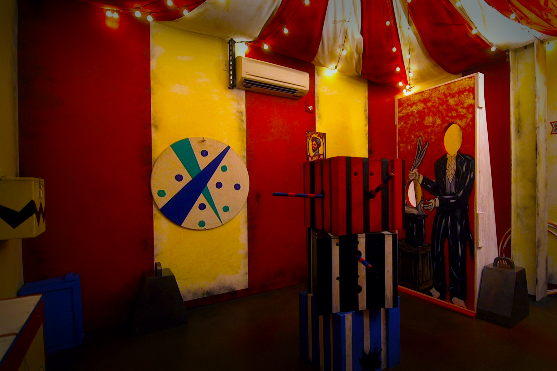 Inside the carnival tent in the Fair Game episode