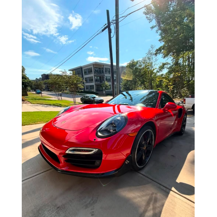 Red Porsche showcasing a deep glossy finish after professional exterior detailing. Mobile Glo Detail 