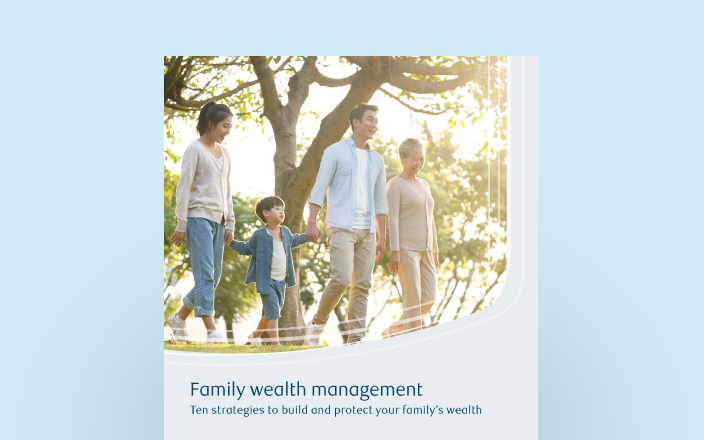 Cover of the family wealth guide with a multigenerational family.