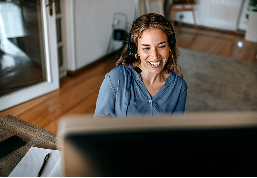 A professional on a Webex call at her home office.