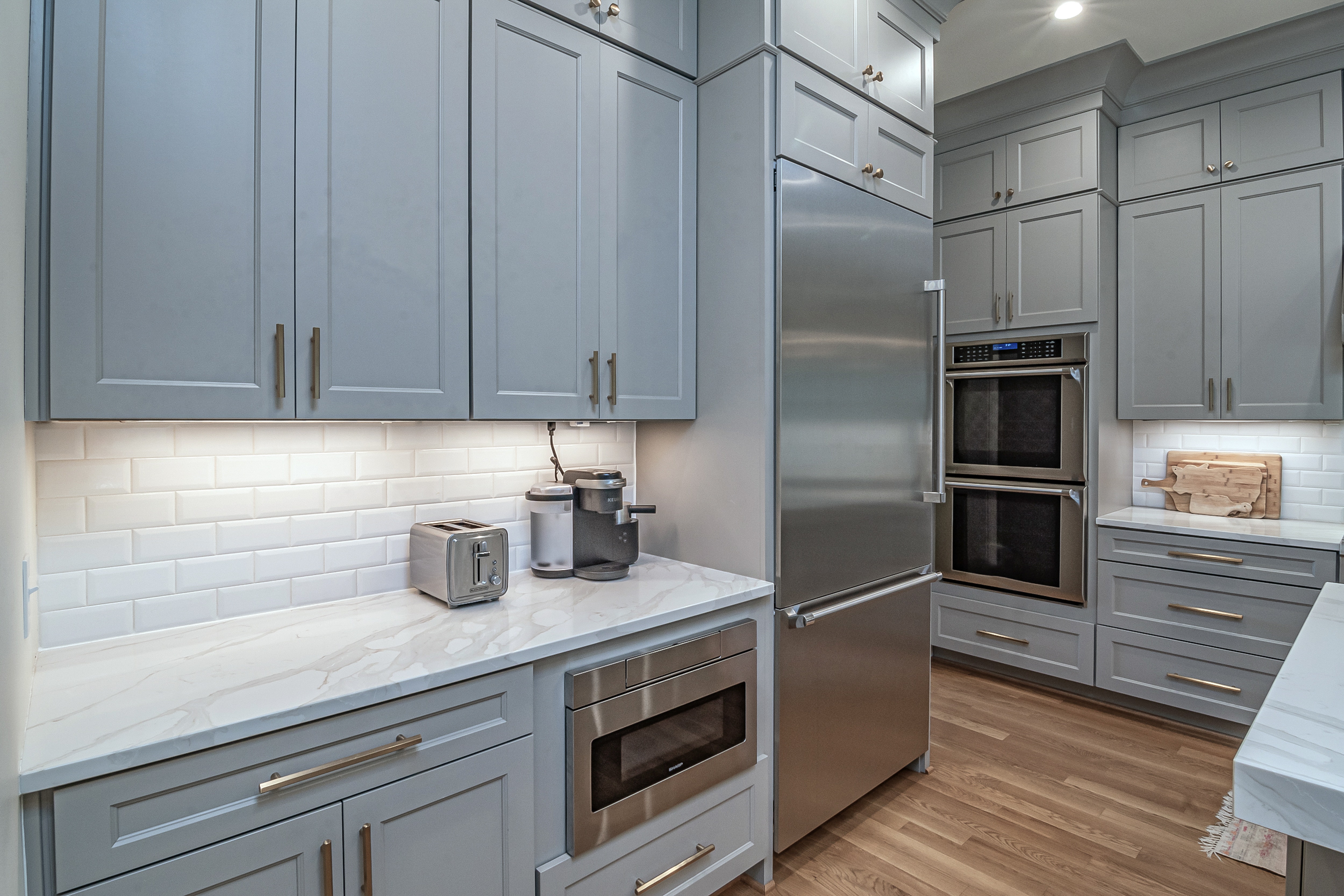 Kitchen after kitchen cabinet painting in Draper, UT.
