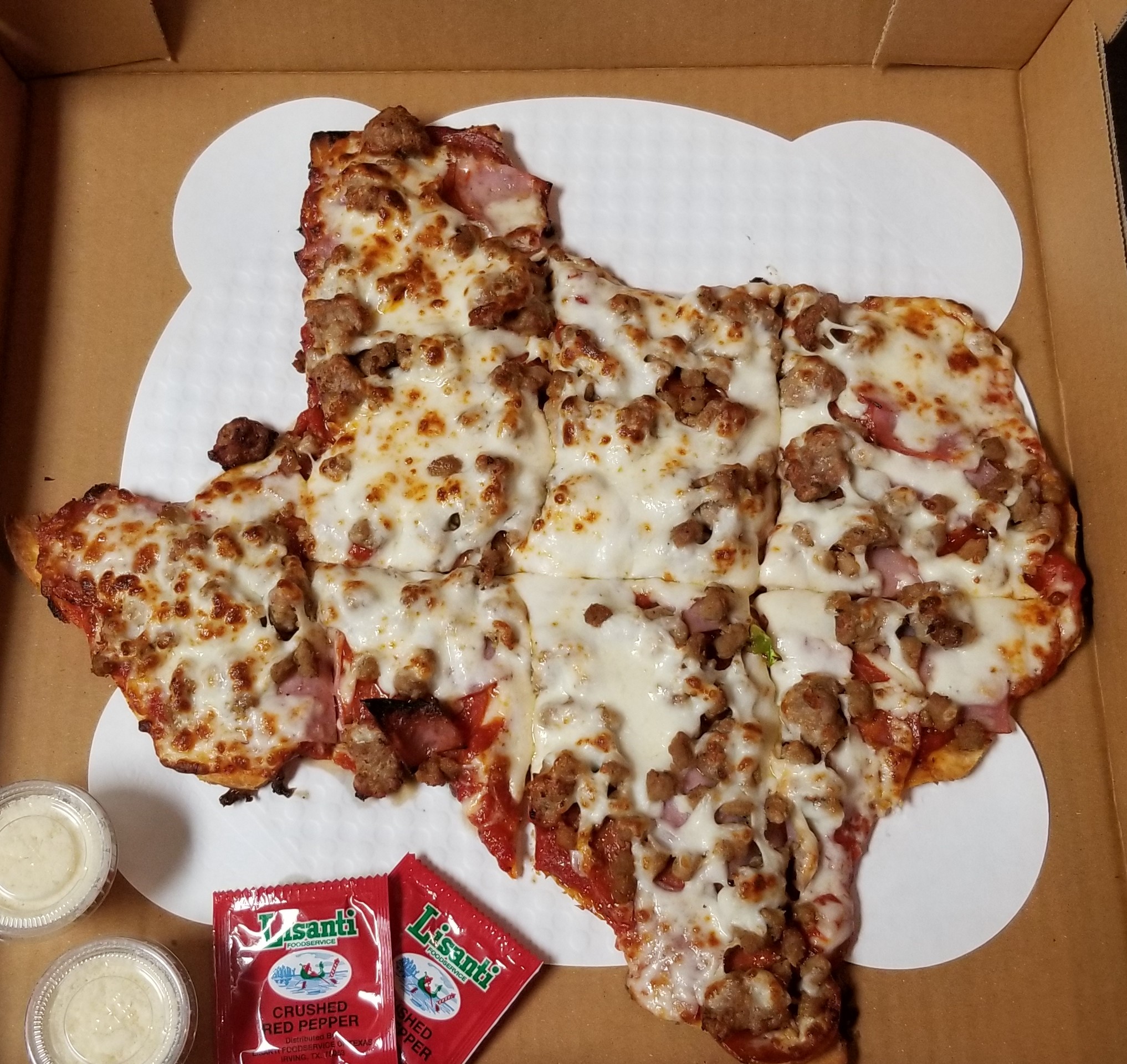 Classic Carnivore pizza shaped like the great state of Texas! Want a Texas Shaped pizza? Just let us know! For only $3.00 more, you get to be in Texas while eating a Texas shaped pizza. Can't get more Texan than that!