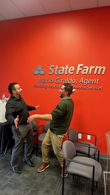 Celebrating the holidays at Mario Giraldo's State  Farm office!