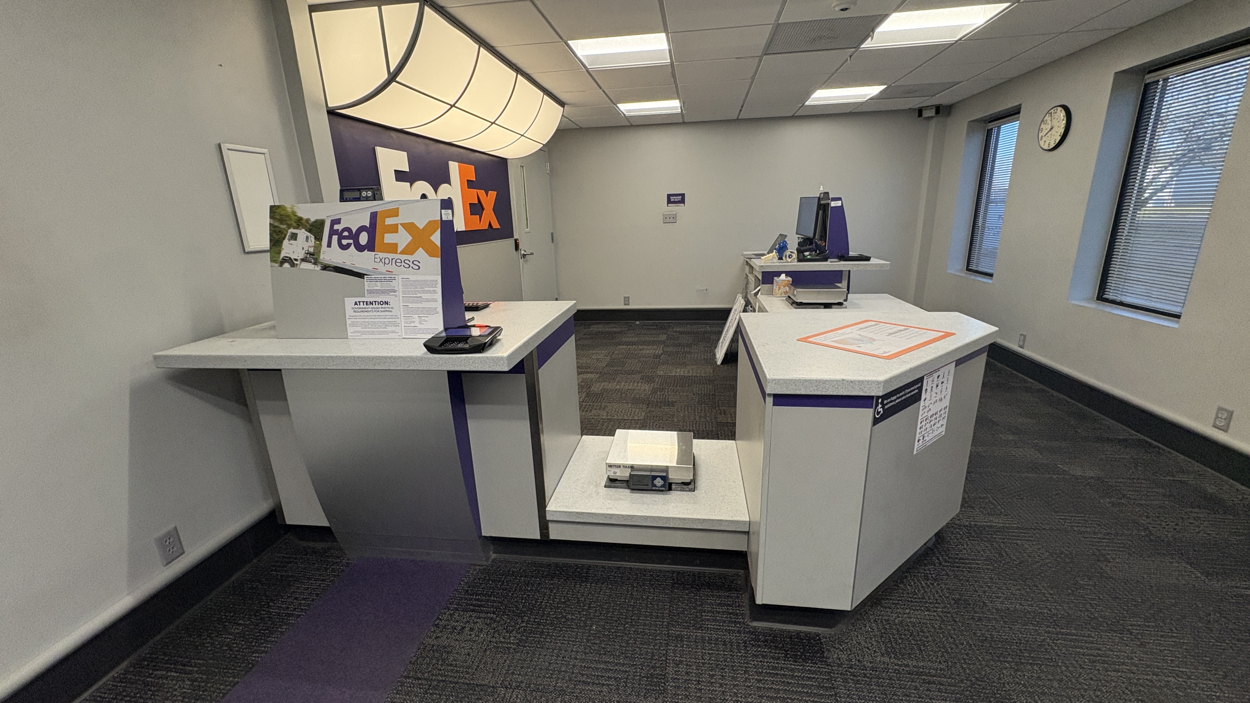 Customer Service and Shipping Area &ndash; Front counter and customer service area at FedEx Ship Center Lincoln Nebraska focused on shipping services and package handling.