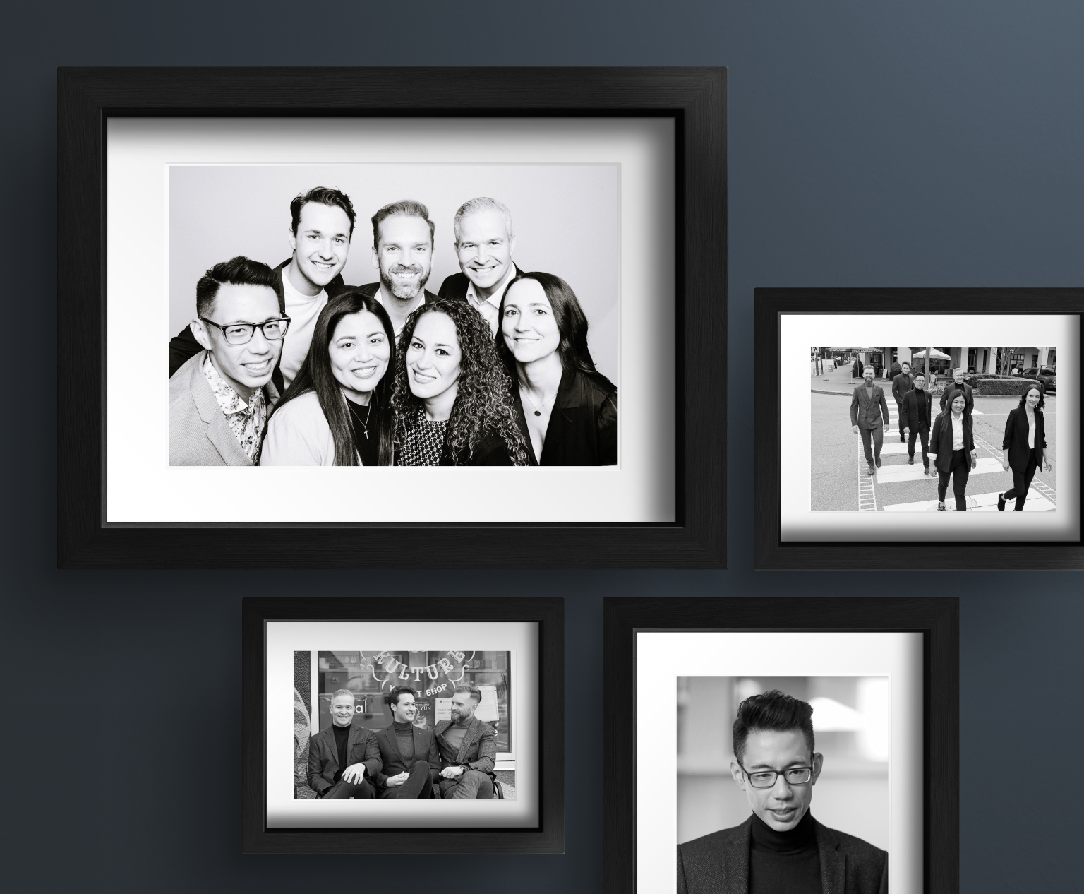 Picture frames with pictures of the Eydt Wealth Partners team.