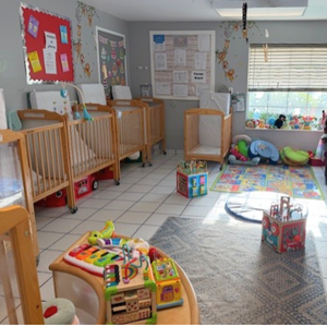 Bright and colorful preschool classroom at Childcare Network with age-appropriate learning materials 