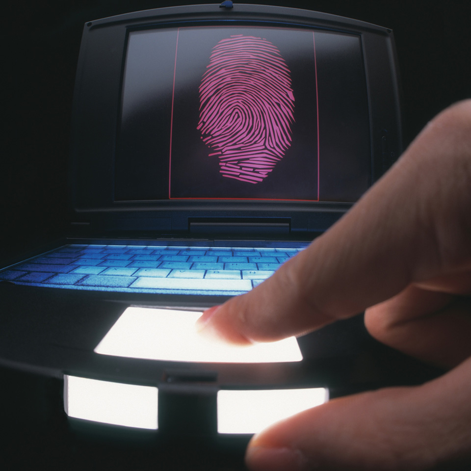 Finger being scanned using a fingprint scanner
