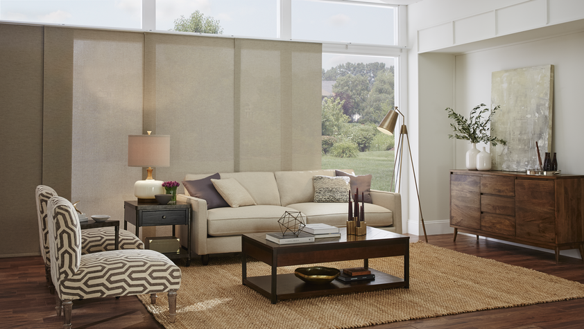 Sliding Fabric Panels offer beautiful coverage for larger patio doors and windows in living rooms or bedrooms. Budget Blinds of Rockwall, Terrell, and Greenville has a wide variety of styles and colors to fit your home.