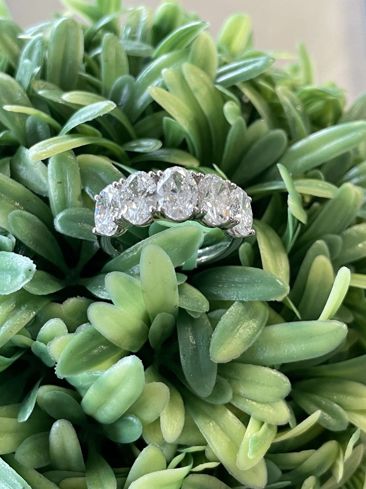 Discover timeless elegance with this 3.75 carat oval lab-grown diamond band in 18K white gold. Five brilliant oval diamonds deliver exceptional sparkle, sustainable luxury, and lasting beauty.