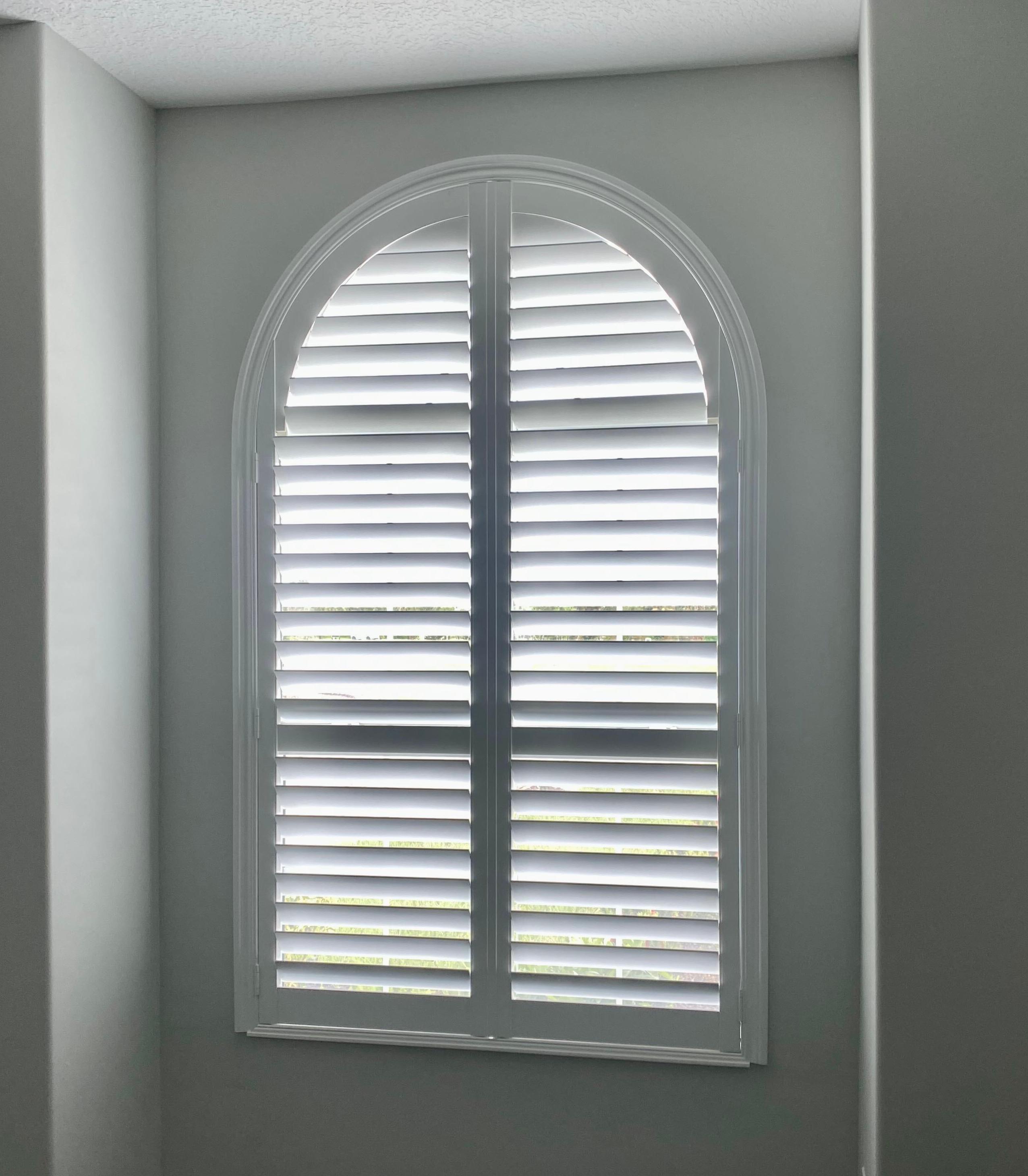 Our wood shutters can be customized to fit any unique window shape all the way from arched to round to octagon styles. This local home beautifully displays our timeless shutters and the ability to conform to any window shape!