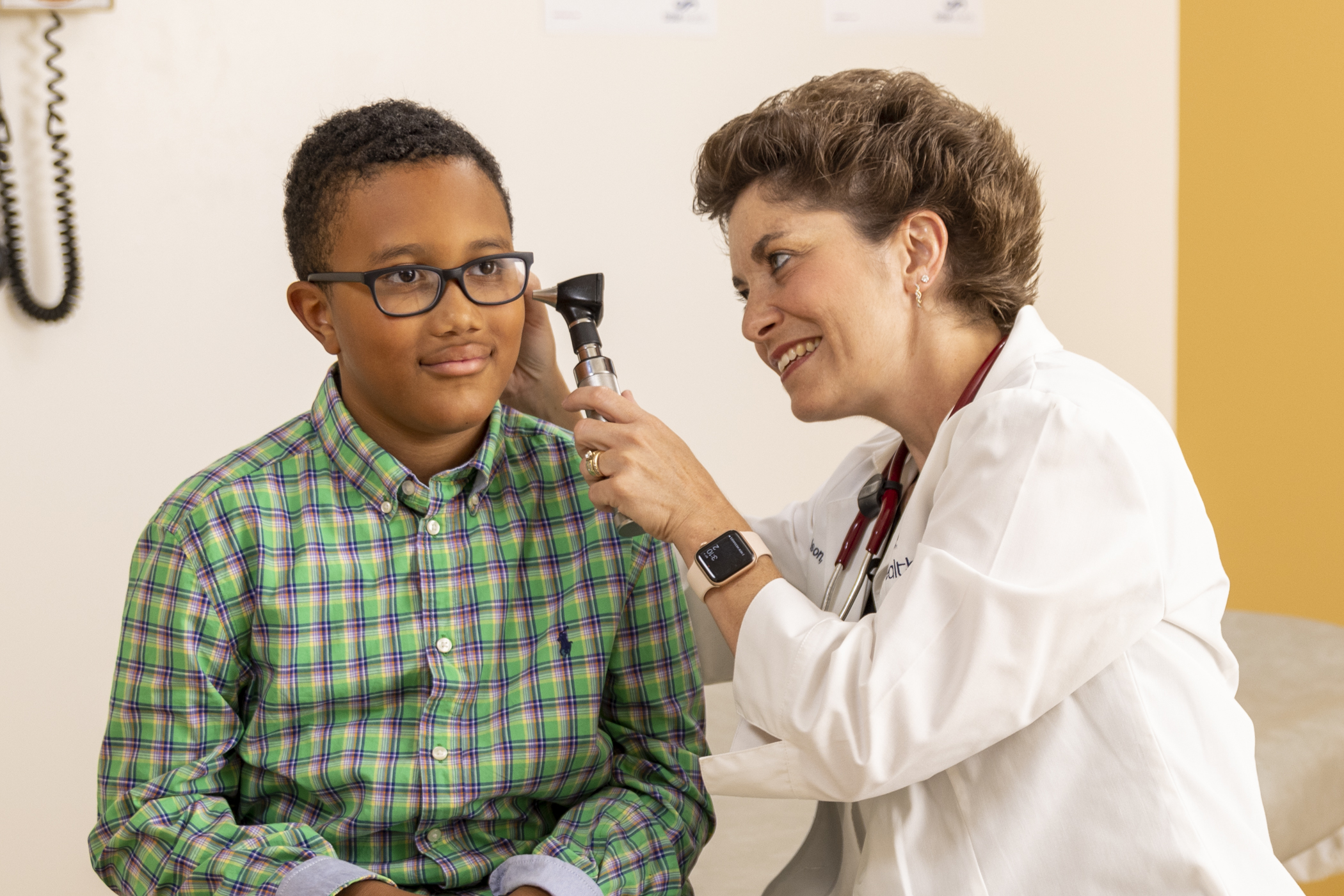 Alison Davison, PA, Family Medicine provider at SSM Health in Centralia, IL with a pediatric male patient.