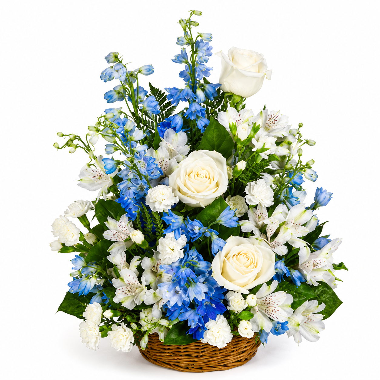 Elegant blue and white sympathy flower basket featuring fresh white roses, blue delphiniums, white alstroemeria, and seasonal blooms in a woven basket. A tasteful floral arrangement suitable for memorial services, funerals, celebrations of life, and expressions of sympathy. Professionally arranged with fresh flowers for a timeless and heartfelt tribute.
