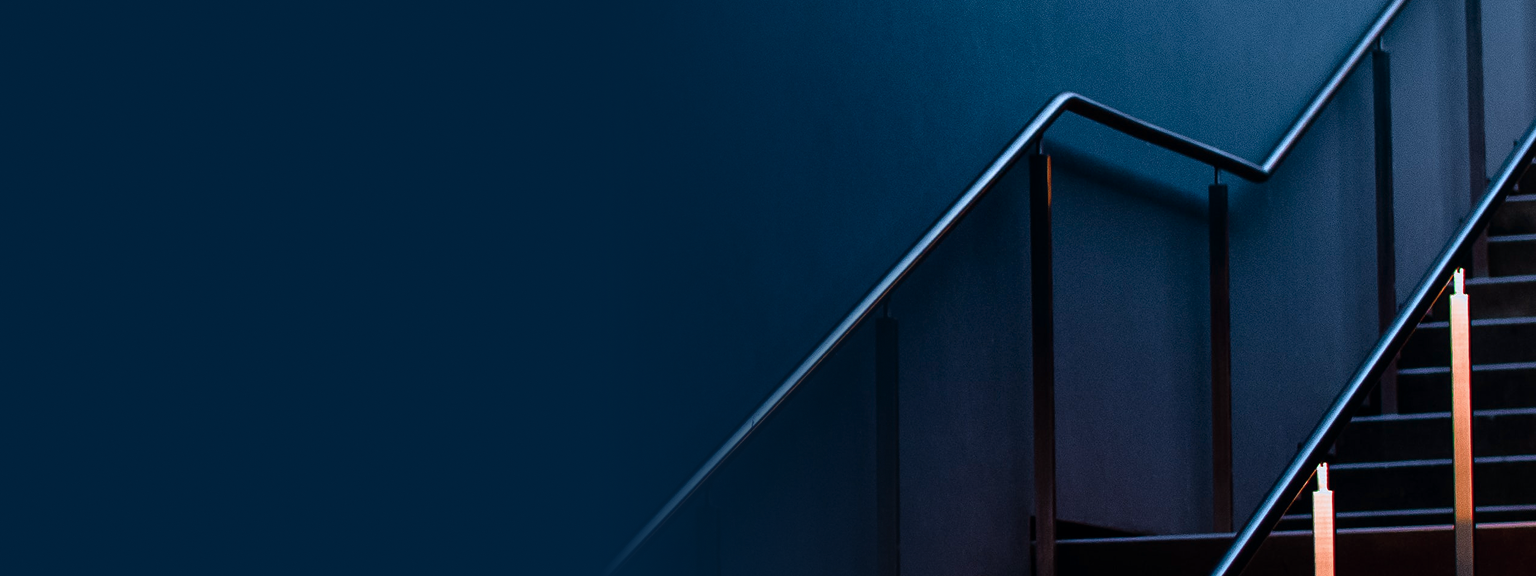 A beautiful, well-lit blue staircase.
