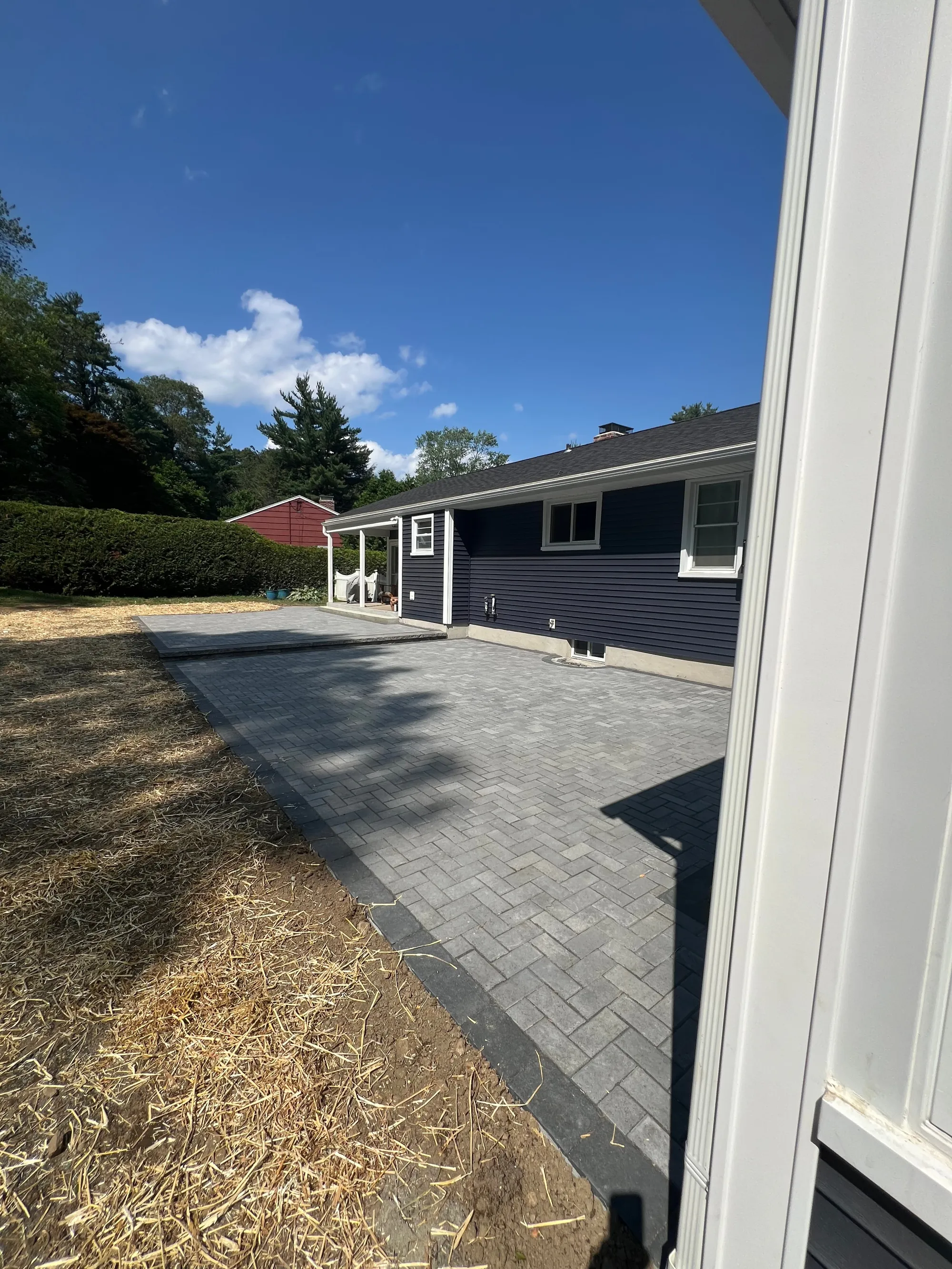 Tiered paver patio taking shape in Trumbull CT - Multi-Layered Paver Patio, Trumbull project by General Masonry LLC.