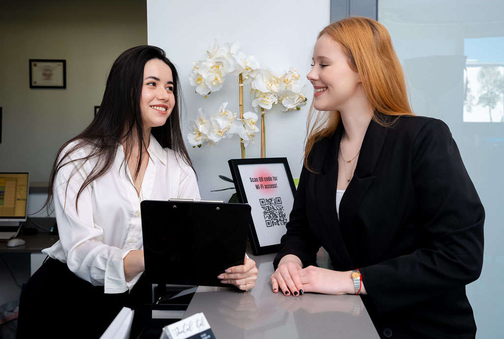 Dental reception consultation in North Miami Beach, FL.