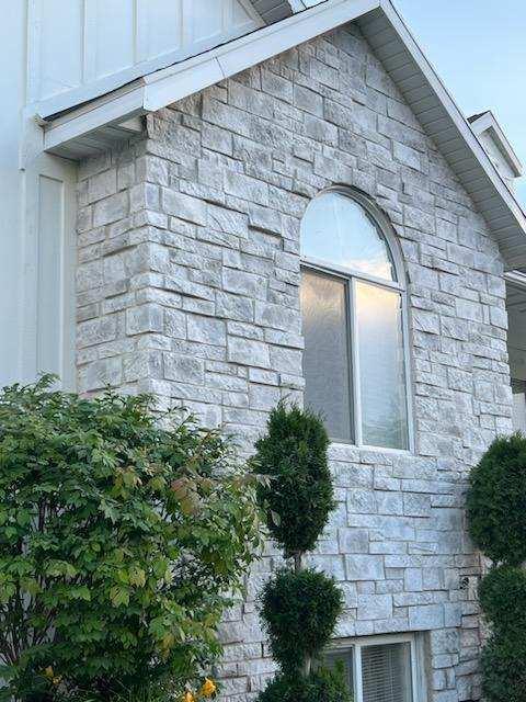 stone on the exterior of the home