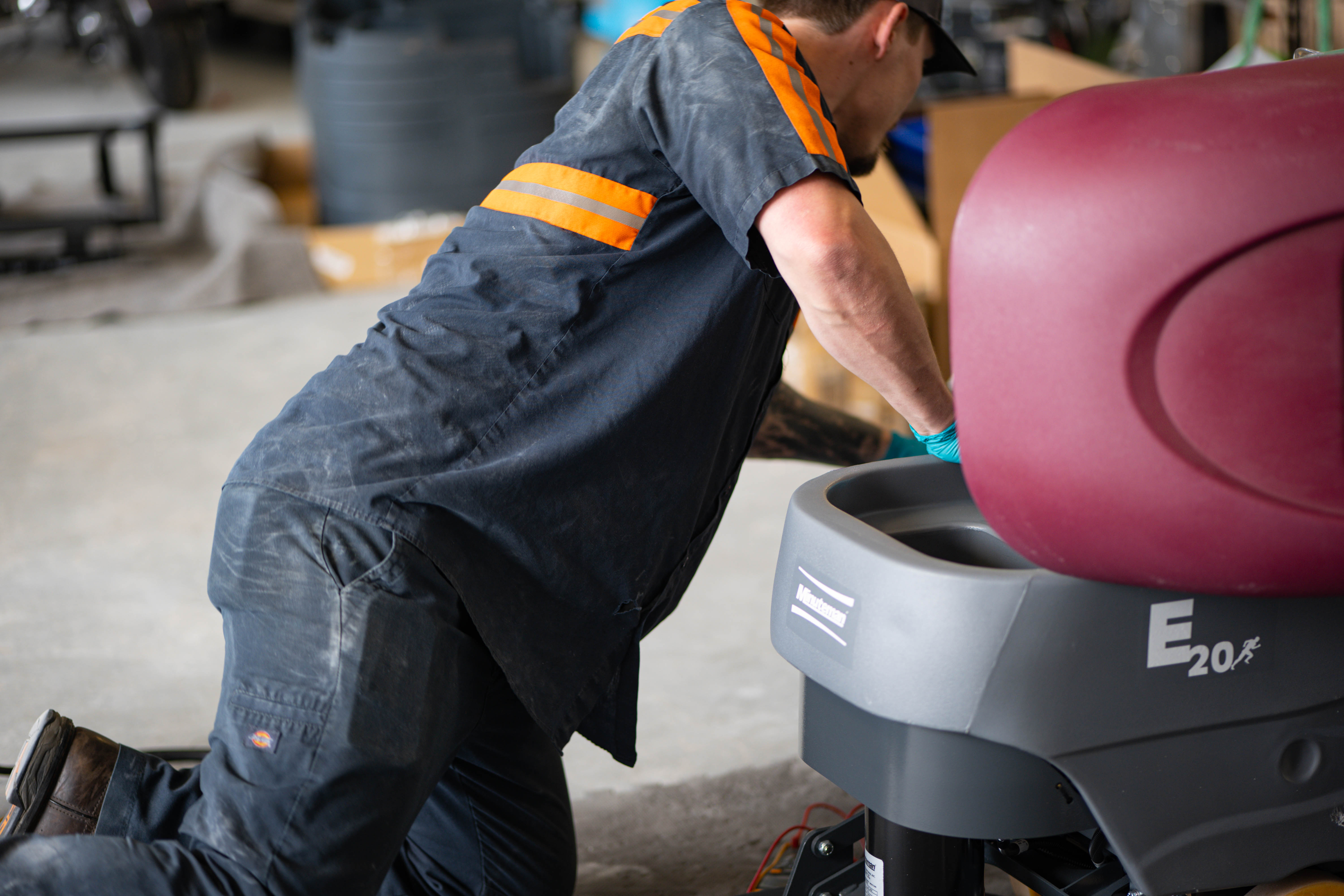 WaySolutions lead technician Kaden services a high-tech i-mop XL autonomous robotic floor scrubber. As commercial cleaning technology advances, our Layton, Utah facility provides the specialized repair expertise and advanced genuine spare parts required to keep your next-generation fleet running at peak efficiency.