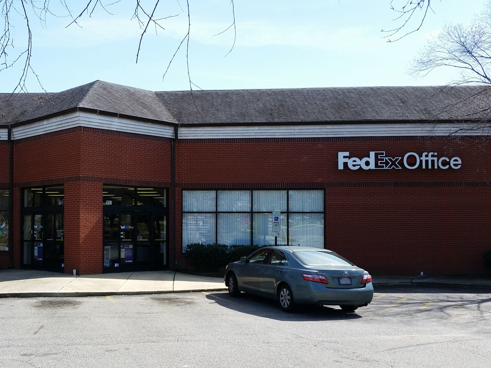 Exterior photo of FedEx Office location at 908 Springfield Commons Dr\t Print quickly and easily in  FedEx Office Print & Ship Center Raleigh (919)876-2488