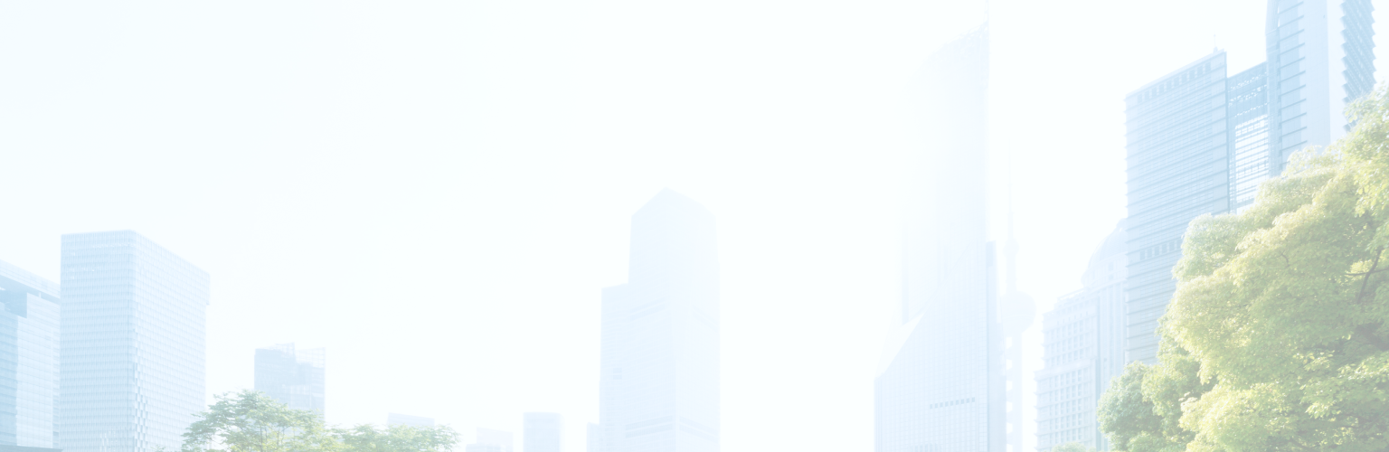 Office buildings in a city surrounded by trees.