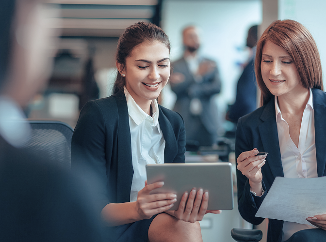 Premier bankers reviewing statements.
