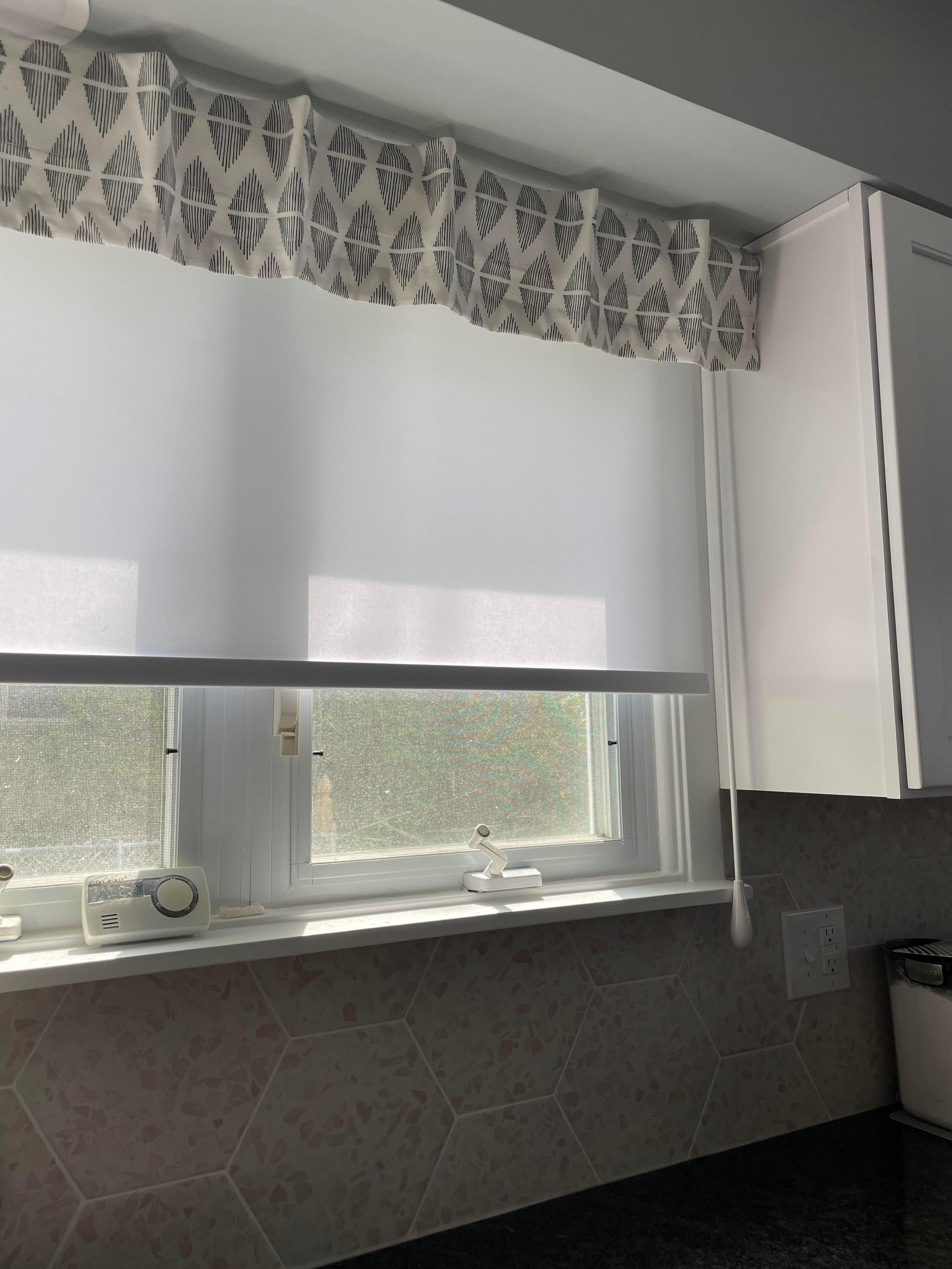 Add a custom valance to your roller shade for a completed finish.