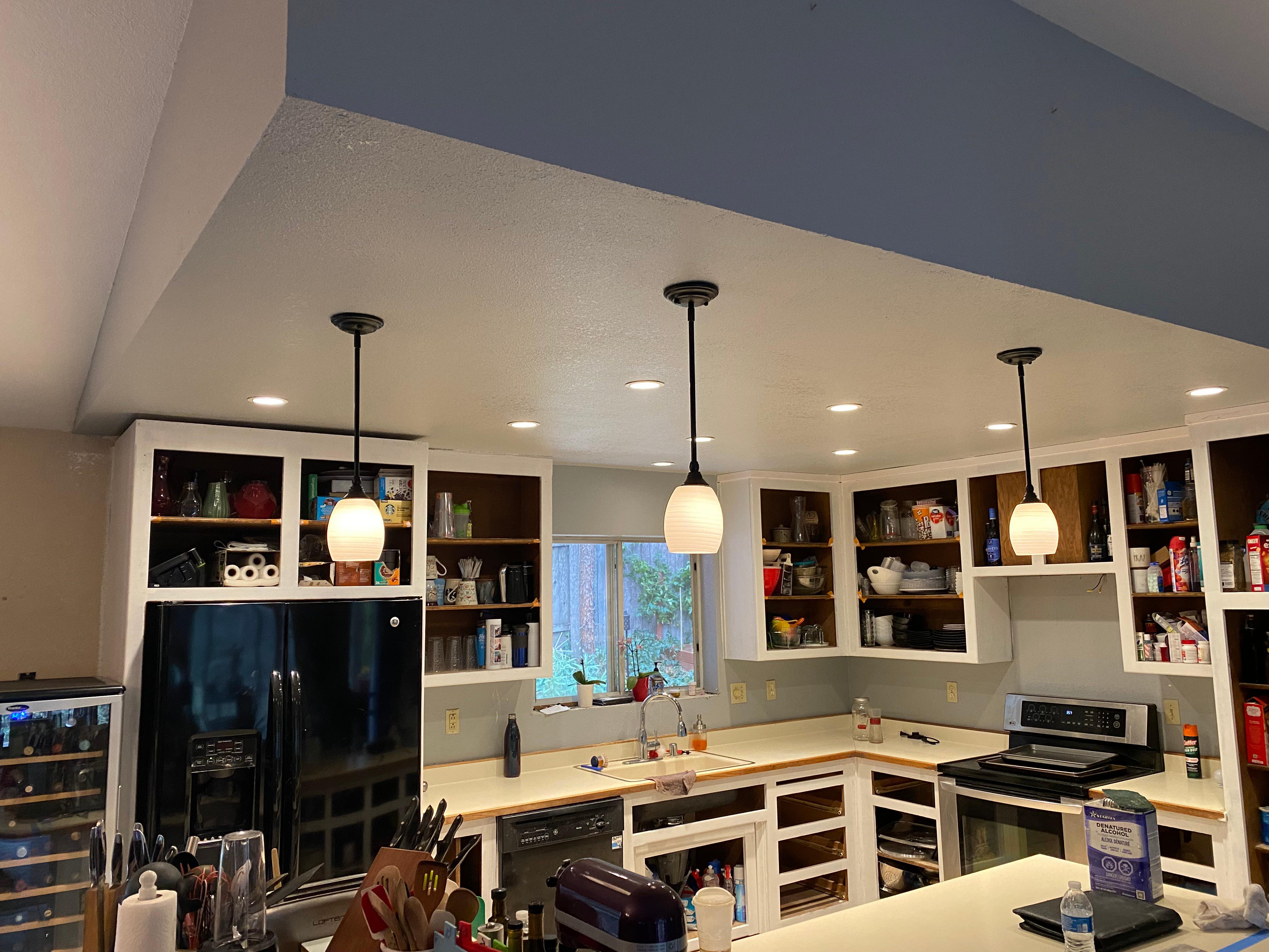 new flat ceiling, recessed light and 3 new pendulum light