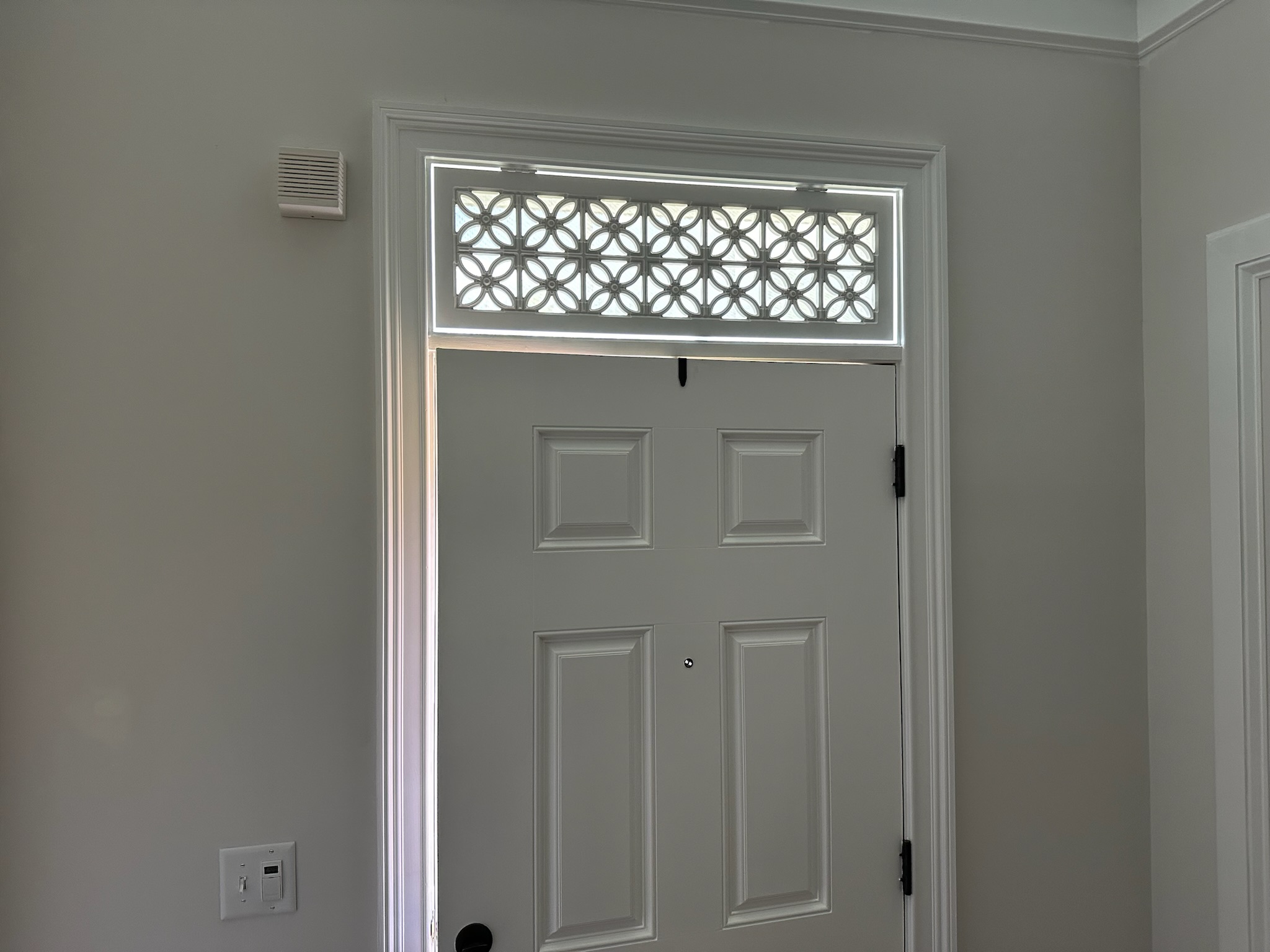 Budget Blinds offers unique transoms for your doors and windows.