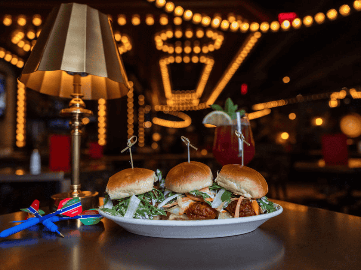 Step into Flight Club for a lively mix of social darts, curated cocktails, and elevated bar fare designed to keep the energy going.