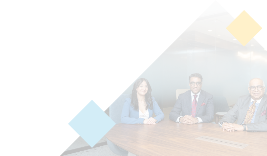 Sandra Scoleri-McDaid, Moe Anwar, and Imtiaz Seyid seated next to each other in a boardroom.