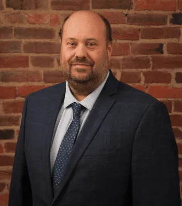Gary is licensed to practice law in both Indiana and Kentucky. He concentrates his practice in estate planning, estate and trust administration, estate and trust litigation, guardianships, elder law and special-needs planning. Gary earned his J.D. from the University of Louisville, Louis D. Brandeis School of Law, and formerly practiced law at Bingham Greenebaum Doll and Wyatt, Tarrant & Combs.