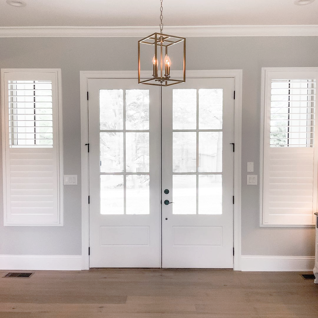 The perfect balance between privacy and light control. Shutters allow you to customize how much light you let into your space. This entryway features shutters that are closed at the bottom but open at the top to let in some natural light.