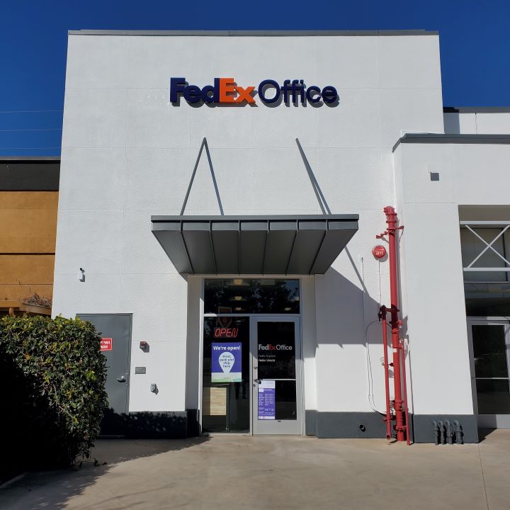 Exterior photo of FedEx Office location at 2340 E Vineyard Ave\t Print quickly and easily in the self-service area at the FedEx Office location 2340 E Vineyard Ave from email, USB, or the cloud\t FedEx Office Print & Go near 2340 E Vineyard Ave\t Shipping boxes and packing services available at FedEx Office 2340 E Vineyard Ave\t Get banners, signs, posters and prints at FedEx Office 2340 E Vineyard Ave\t Full service printing and packing at FedEx Office 2340 E Vineyard Ave\t Drop off FedEx packages near 2340 E Vineyard Ave\t FedEx shipping near 2340 E Vineyard Ave