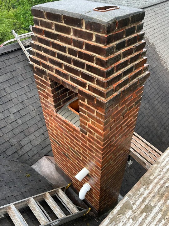 Specializes in brick pointing, chimney repair, and masonry services.