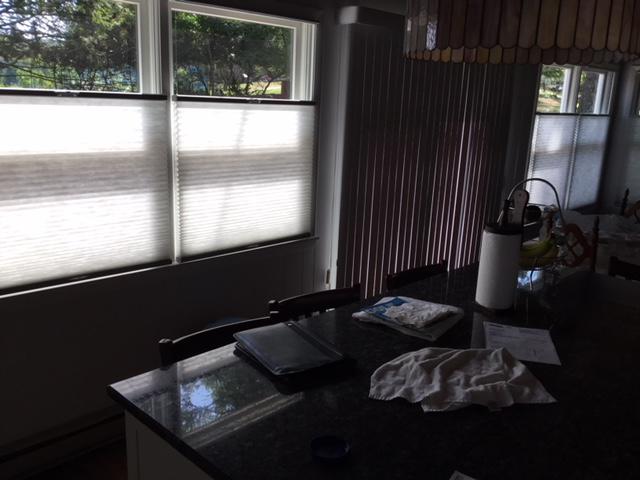 Check out this Ossining home! For the doors, we installed our Vertical Blinds—and they’re doing a great job keeping it nice and shady in here!