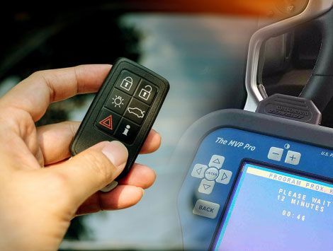 This image represents our smart car key programming service at AAA&B Locksmith LLC, where we utilize high-tech computers to program keys for various vehicle models accurately and efficiently.