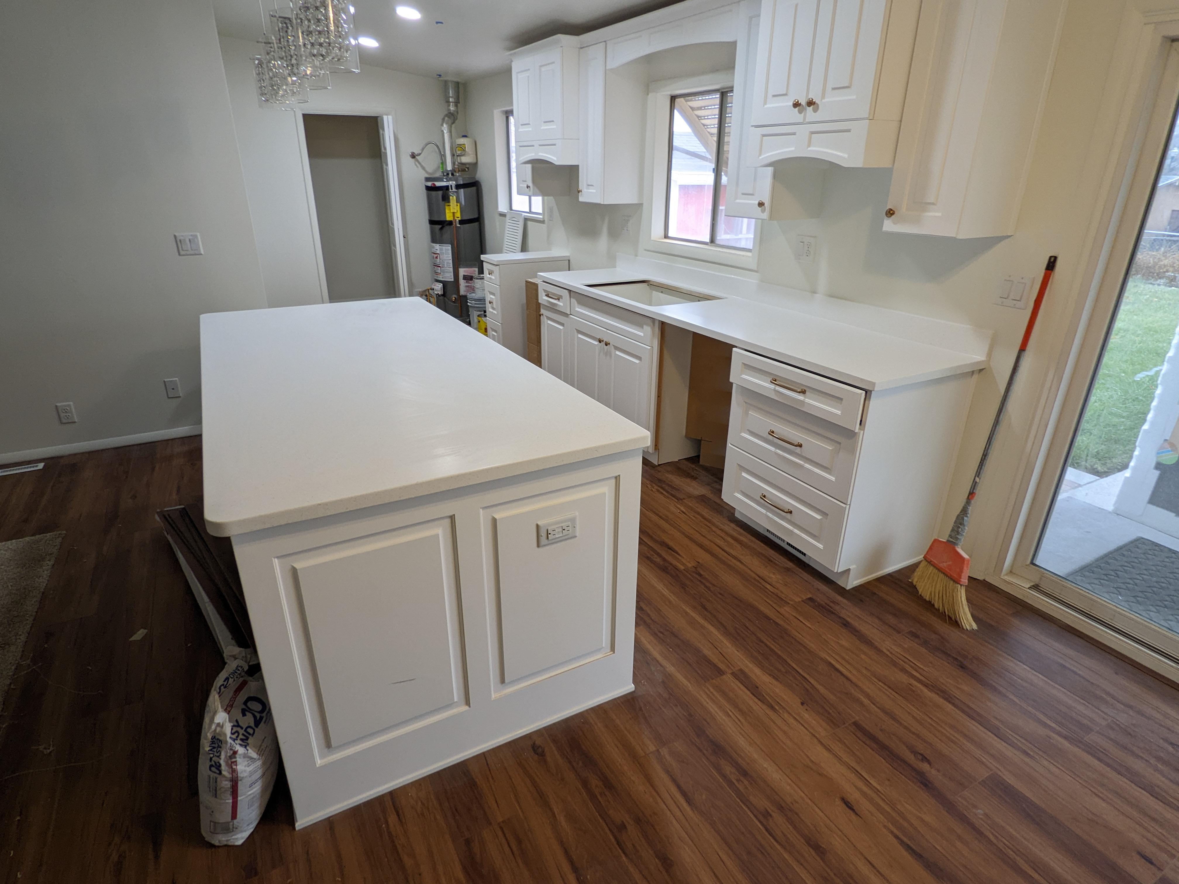 New kitchen cabinets being installed