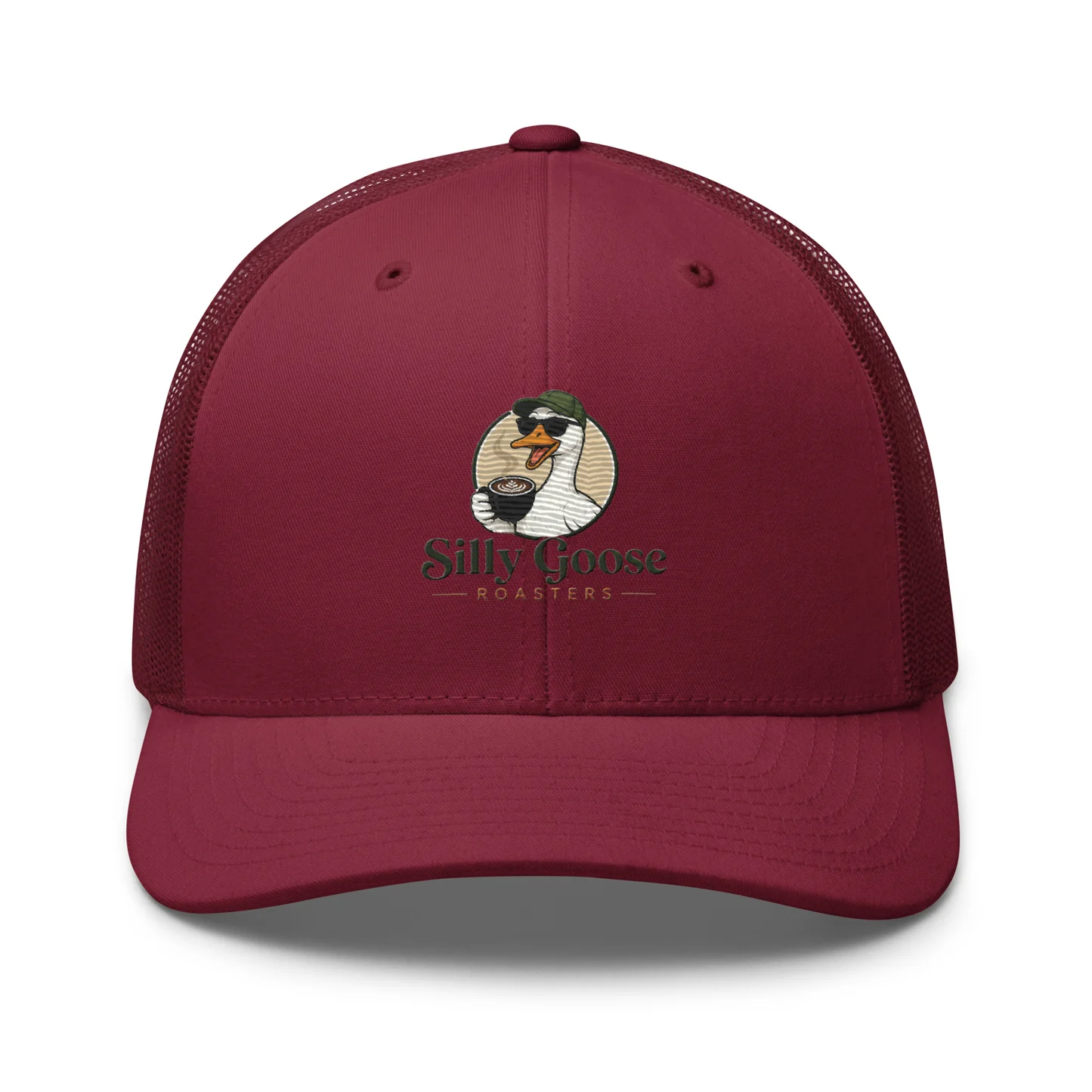 A maroon trucker hat with a mesh back, featuring a cartoon goose wearing sunglasses and a green hat, holding a cup of coffee. The text "Silly Goose ROASTERS" is embroidered below the goose.