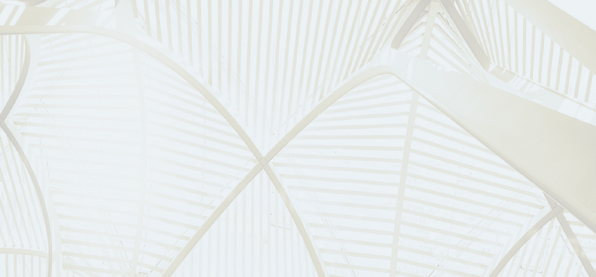 Close-up view of interior architecture featuring sleek, white, curved beams crossing overhead.