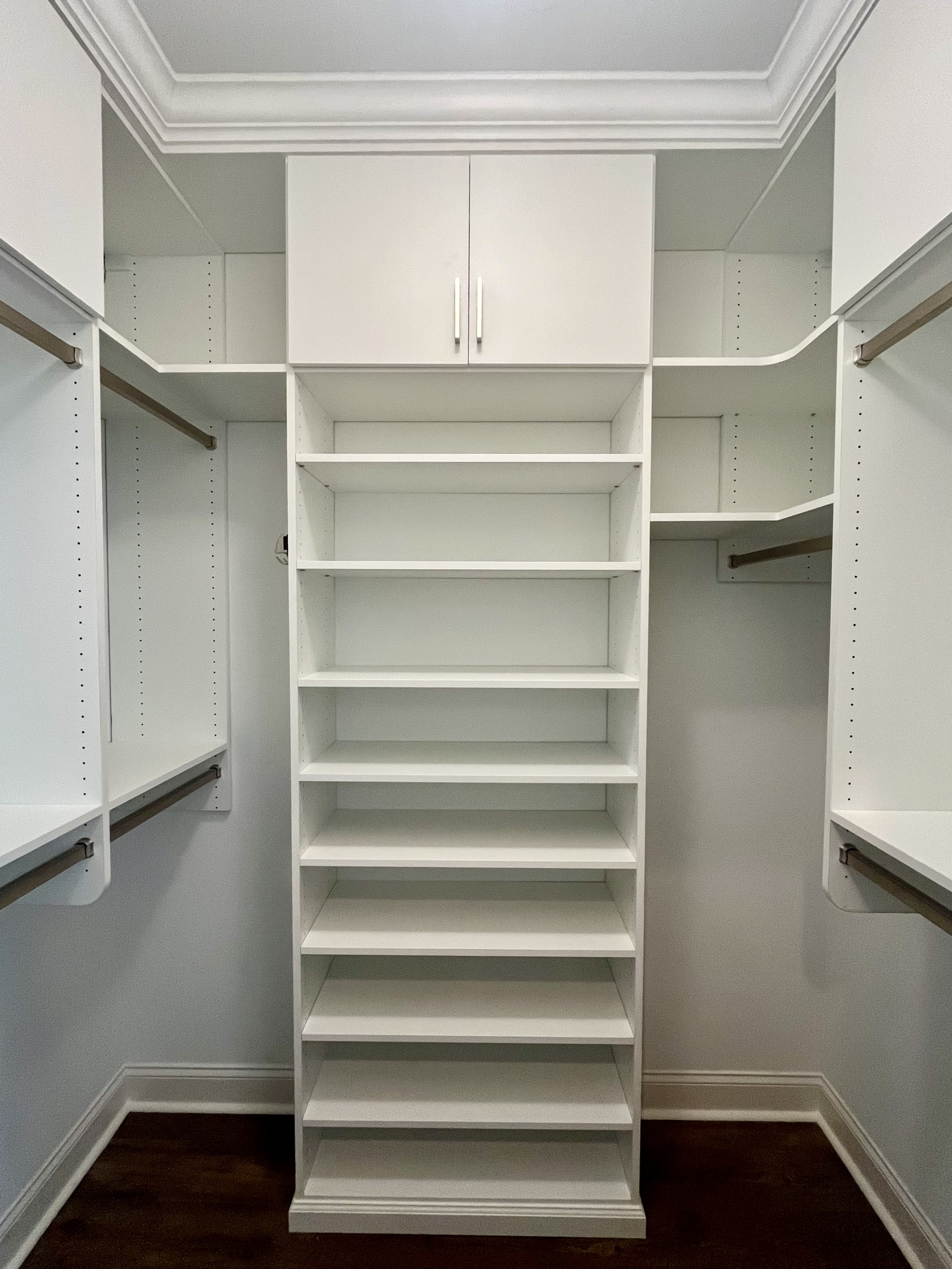 This Lexington Closet has received a glow up! Clean, modern look for all the storage space!