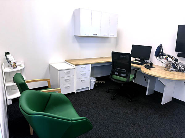Interior photo of the consultation office in the AudioNova hearing clinic in Downers Grove, IL