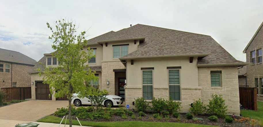 A modern two-story home showcases a professionally installed architectural shingle roof that delivers reliable weather protection, attractive appearance, and lasting performance for residential roofing applications.
