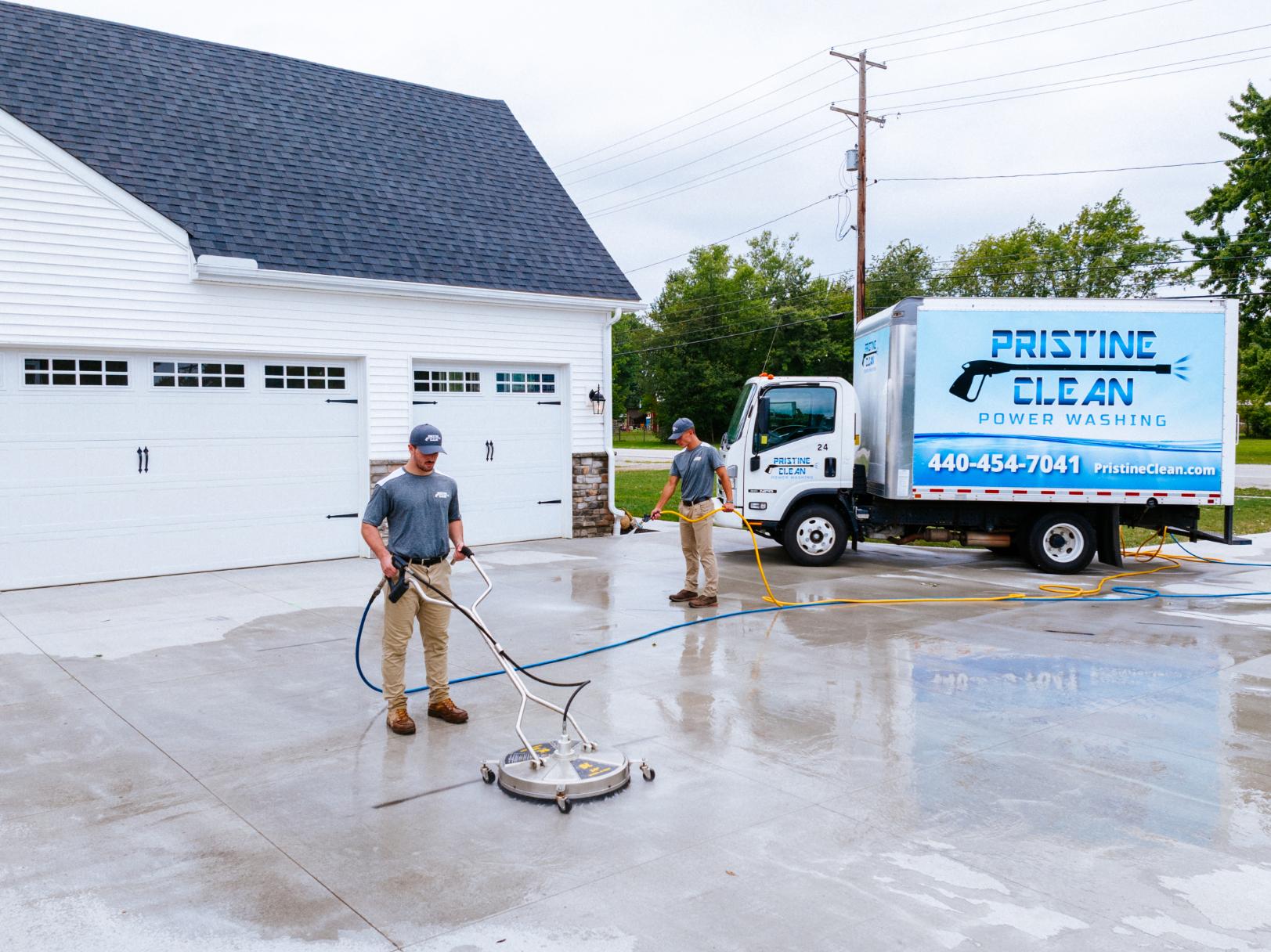 Pristine Clean Employee Concrete Pressure Washing and Sealing