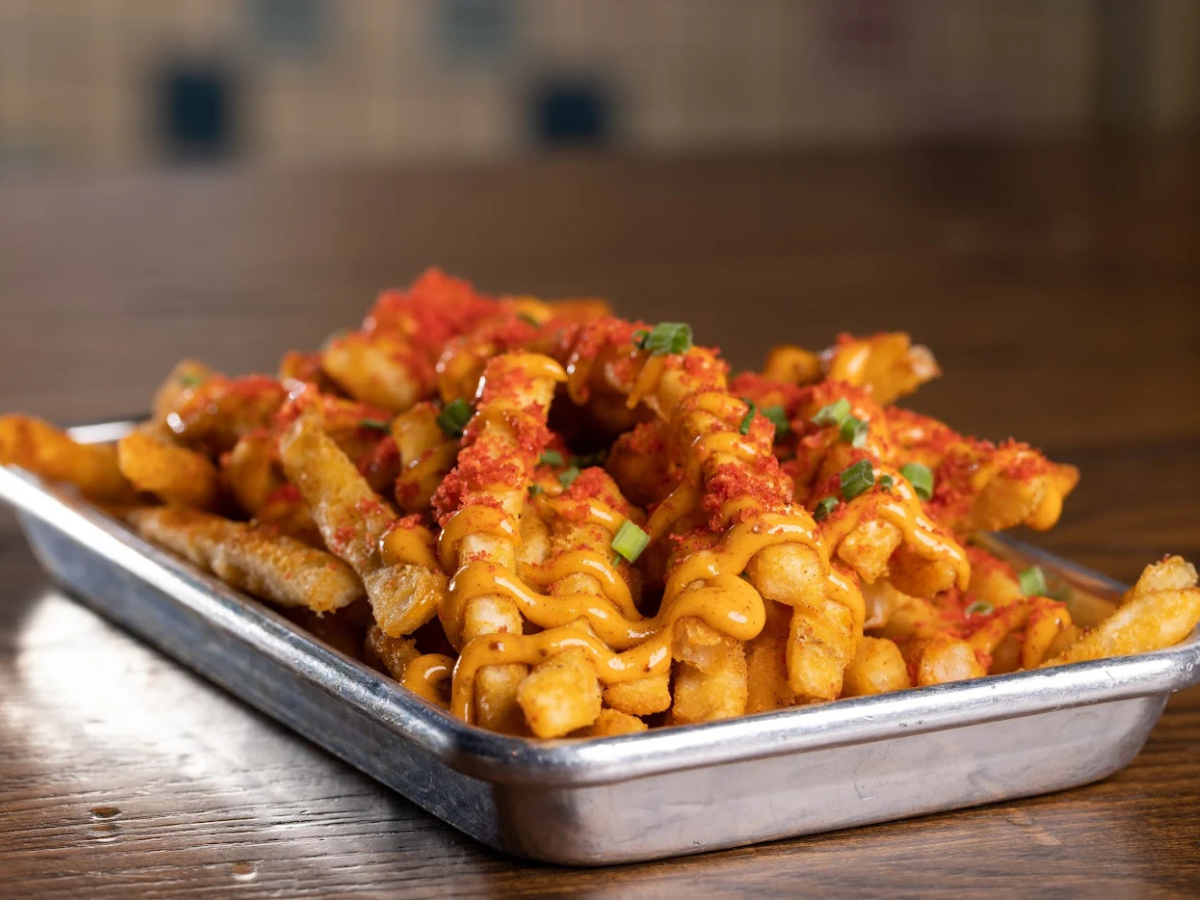 Enjoy more than just axe throwing at Detroit Axe Ferndale with delicious food and shareable bites that elevate your experience. From loaded fries to crowd-favorite snacks, our venue combines high-energy gameplay with great food, making it the perfect destination for group outings, date nights, and events.