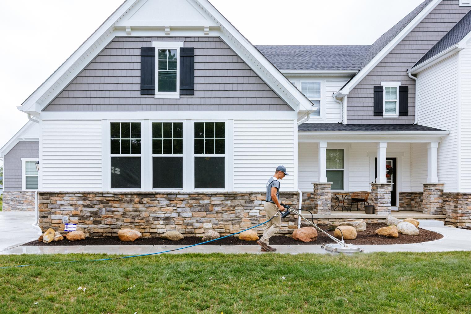 Pristine Clean Employee Concrete Pressure Washing and Sealing