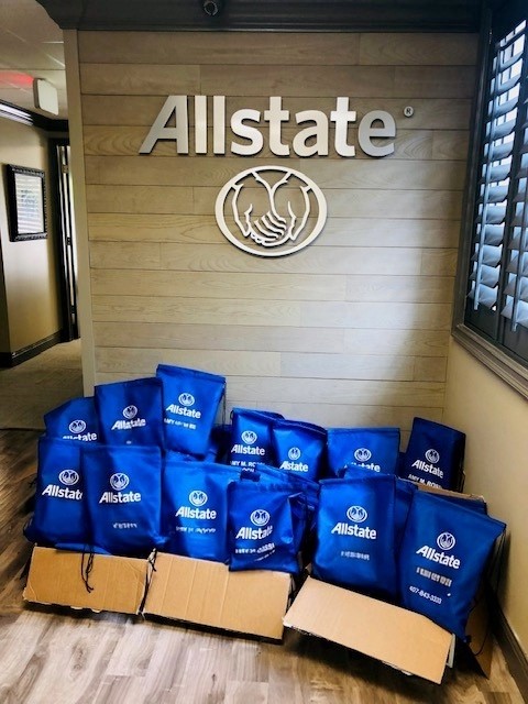 Giving back packs full of water park supplies for Foster youth for Foundation for Foster Children.   