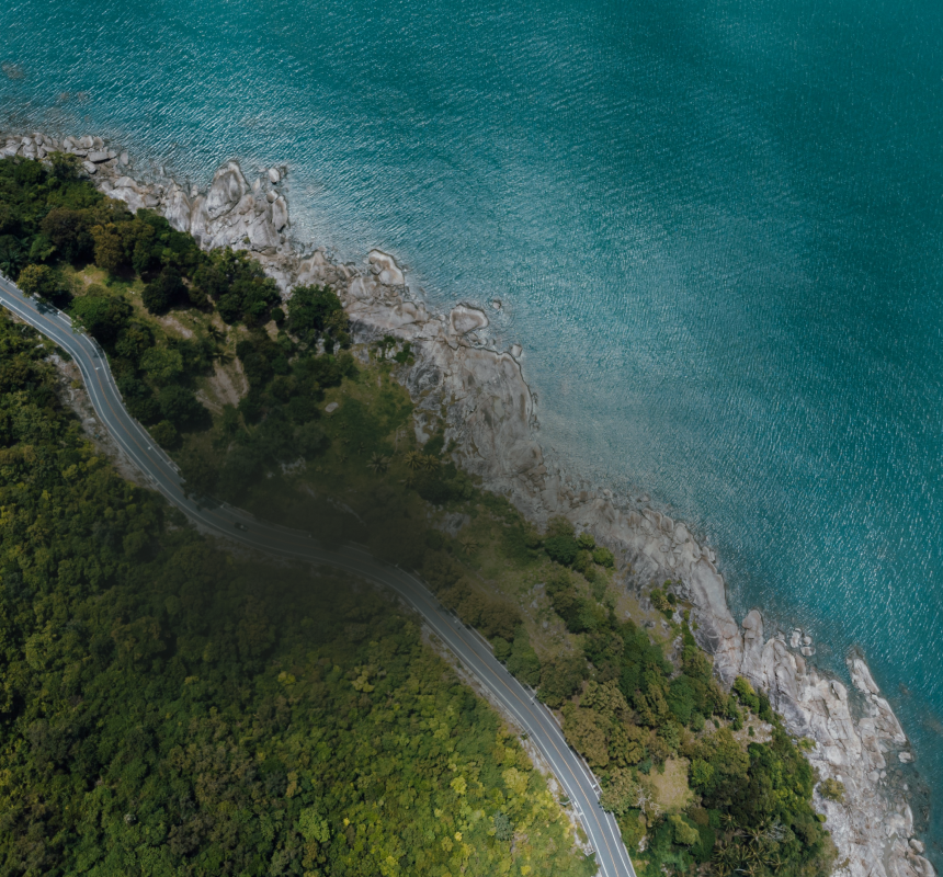 Aerial view of a coastal highway.