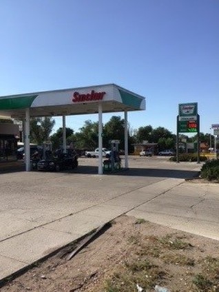 Sinclair gas station fueling island