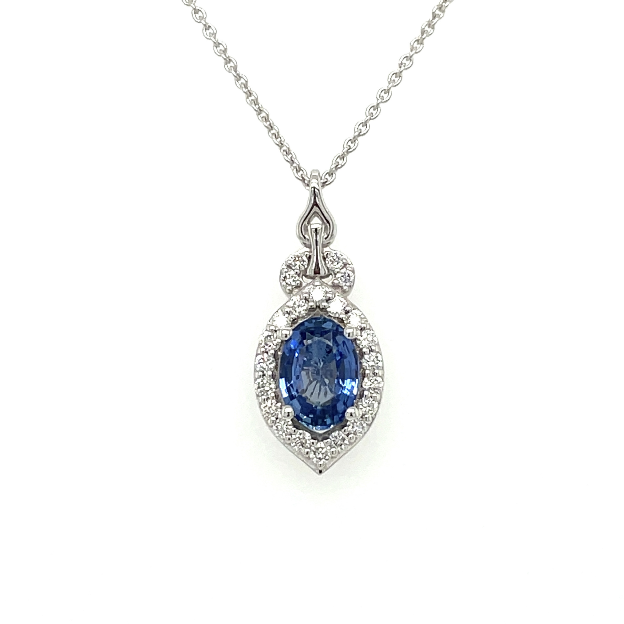 Elevate your style with this 14K white gold Le Vian® necklace featuring a brilliant oval sapphire accented by 0.18 carats of sparkling diamonds. A timeless design with refined elegance.