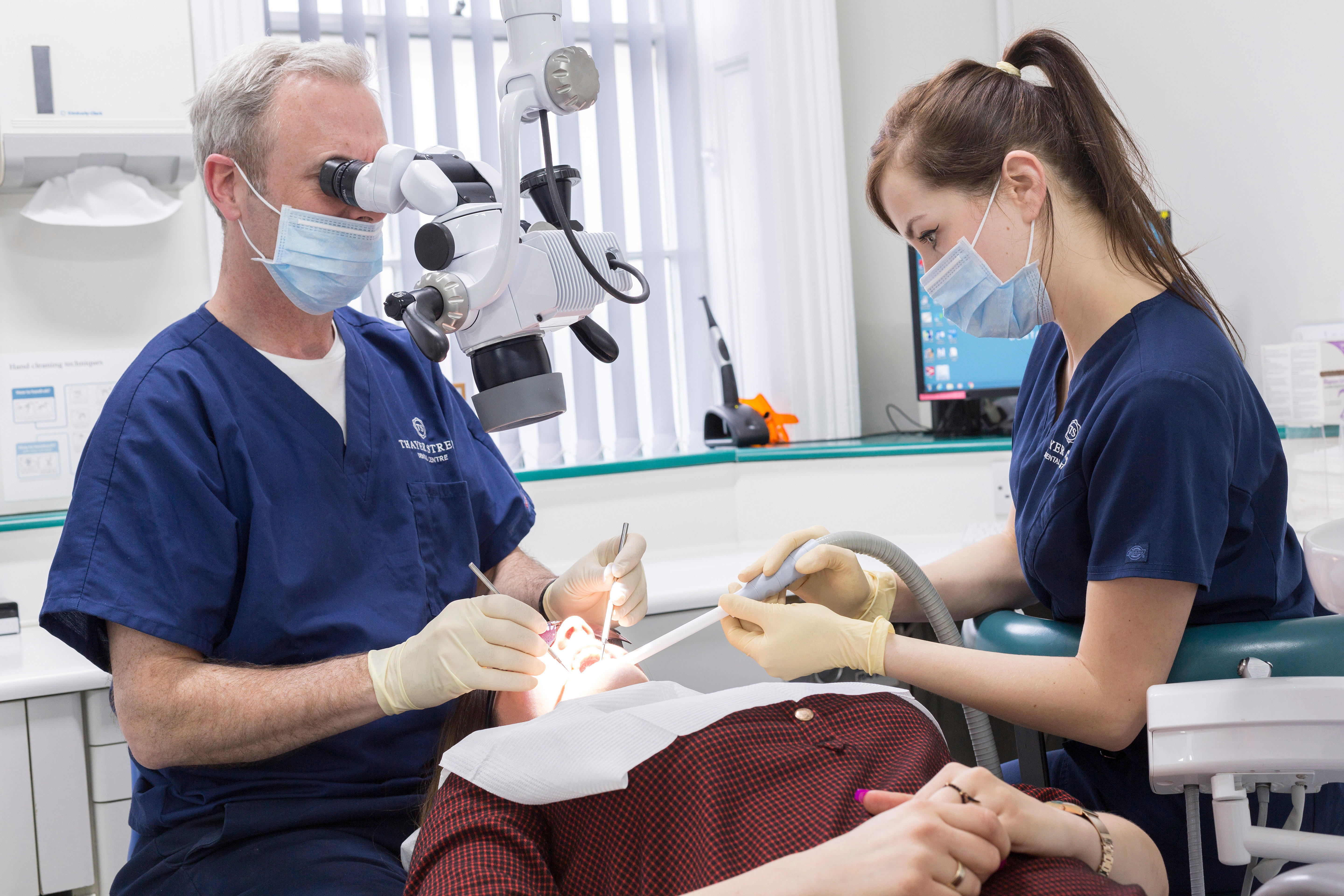 Dr Tim Sunnucks and dental nurse, Monika Wielgosz treat a patient at  Thayer Street Dental Centre Thayer Street Dental Centre London 020 7486 4866