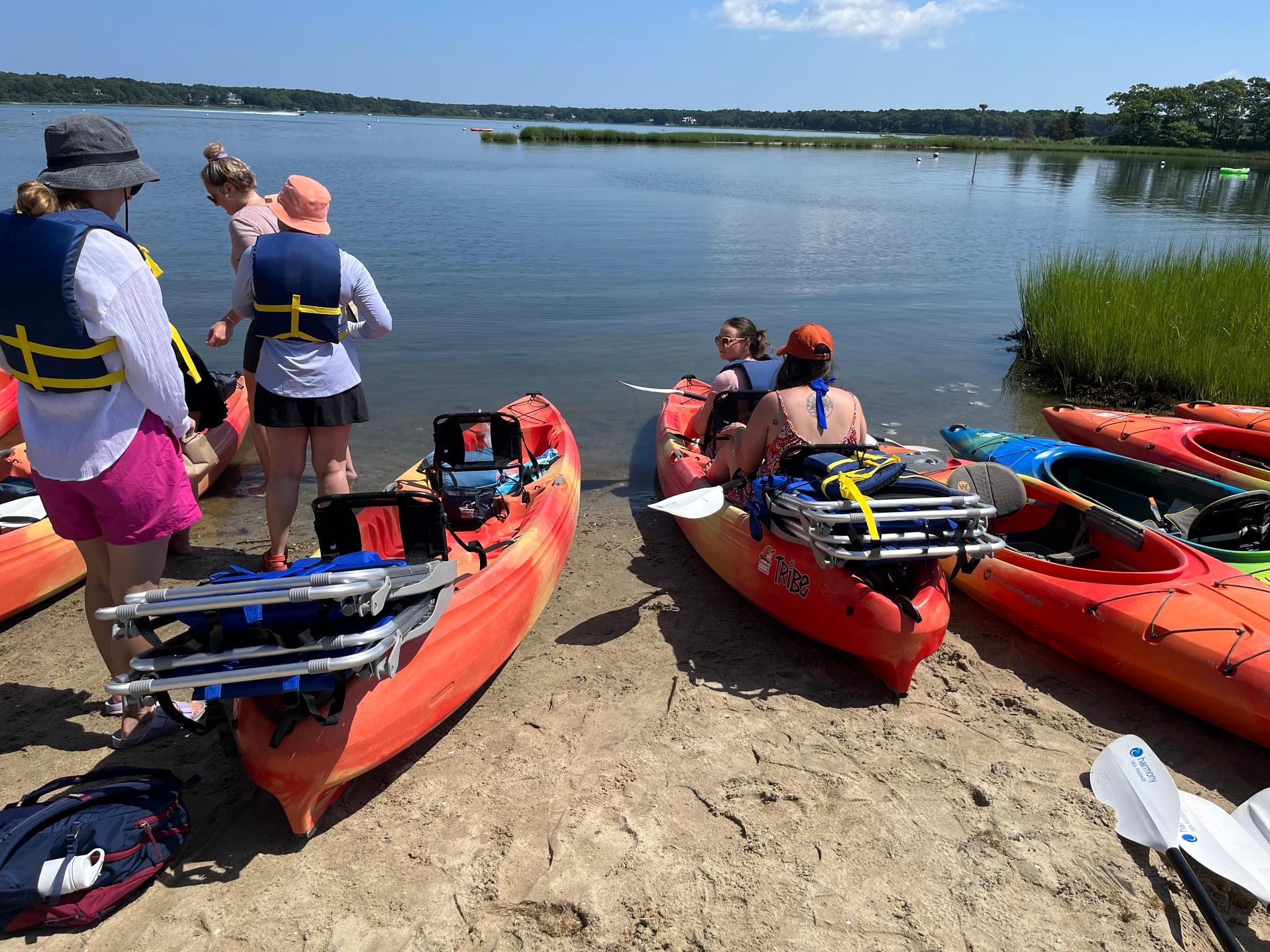 People starting to embark on a Kayaking adventure with RideAway Adventures